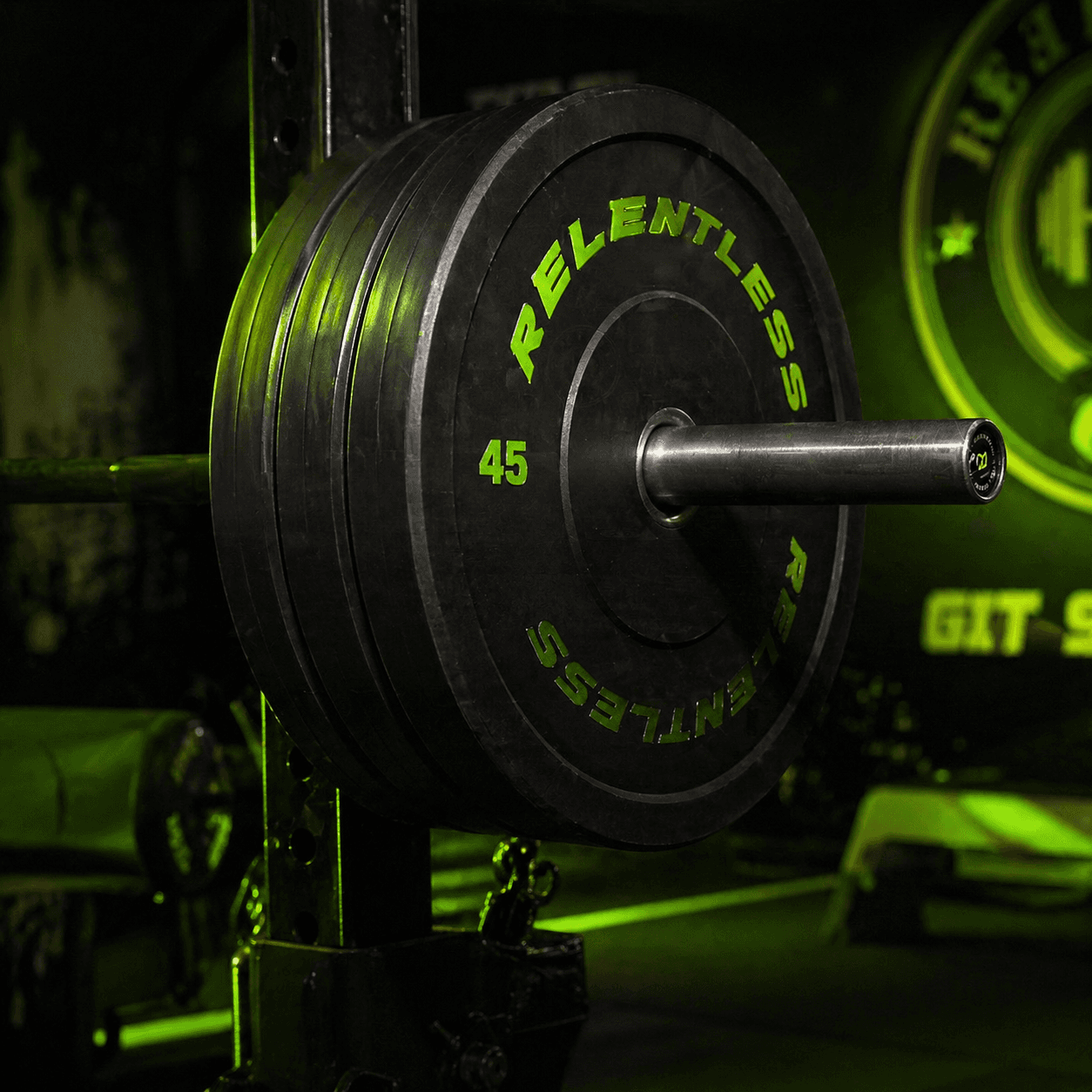 Loaded barbell on the floor at THE F.I.T.T. PIT